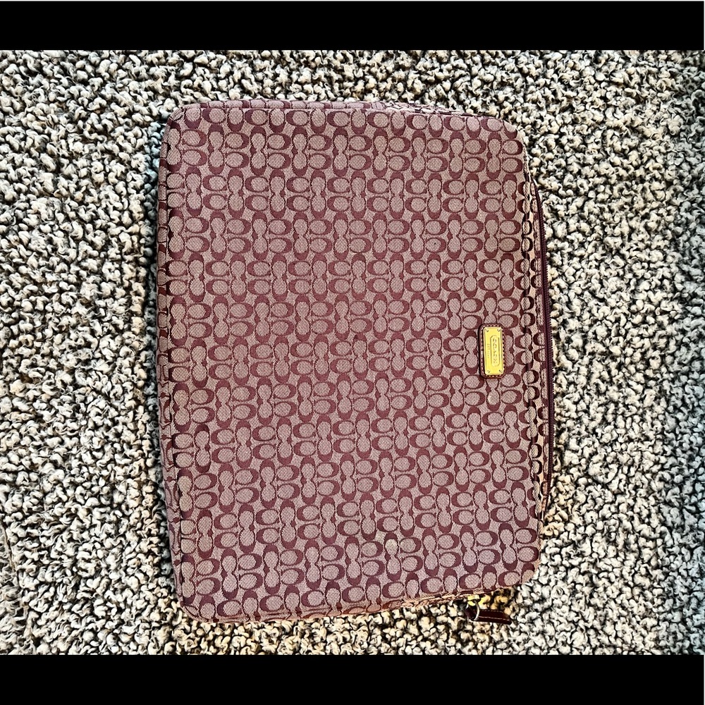Purple Coach laptop carrying case